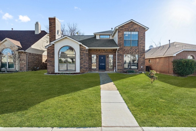 view of front of home with a front yard