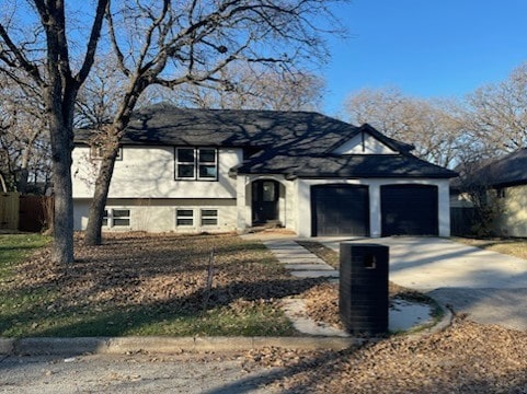 view of front of home featuring a garage