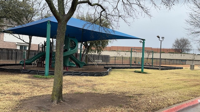 view of playground with a yard