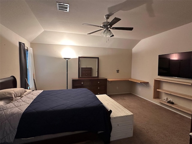 bedroom featuring carpet, vaulted ceiling, and ceiling fan