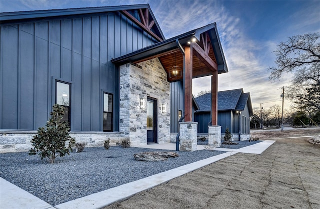 view of property exterior at dusk