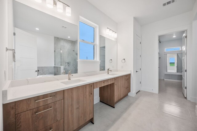 571 N Armstrong Rd, Venus, TX 76084 - full bathroom featuring a sink, a stall shower, double vanity, and visible vents