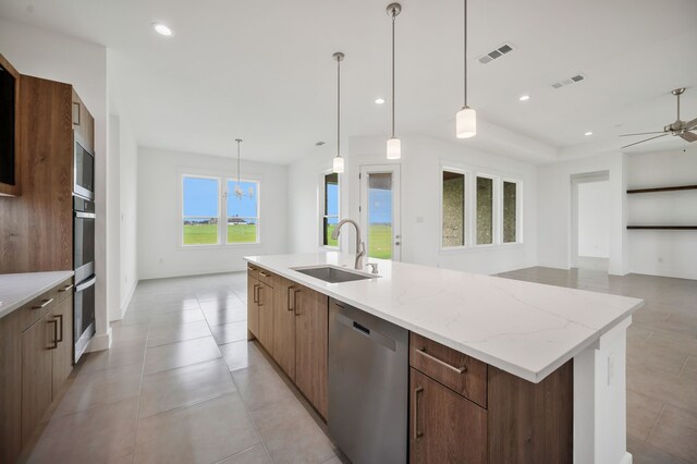 571 N Armstrong Rd, Venus, TX 76084 - kitchen with modern cabinets, ceiling fan, a large island with sink, a sink, and appliances with stainless steel finishes