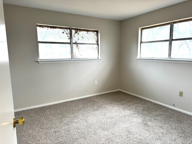 view of carpeted spare room