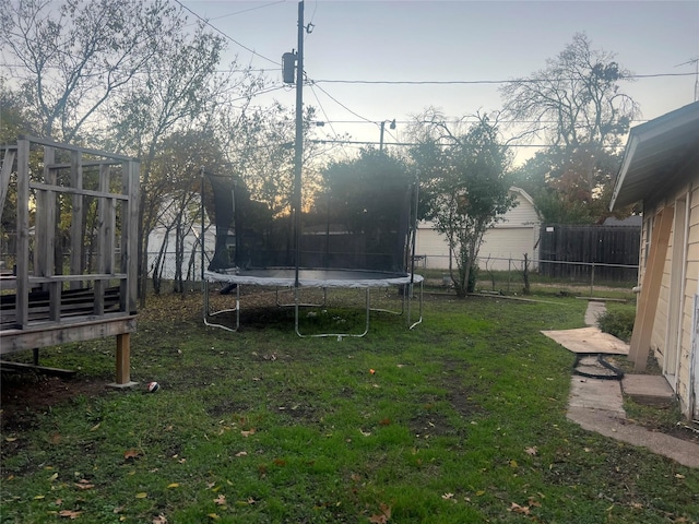 view of yard with a trampoline