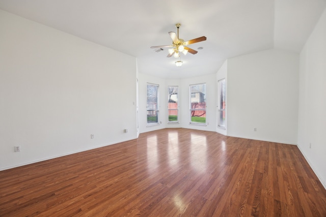 spare room featuring hardwood / wood-style flooring and ceiling fan