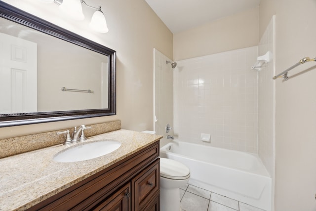 full bathroom featuring tile patterned flooring, vanity, toilet, and tiled shower / bath