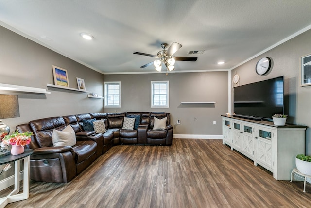 living room featuring crown molding, dark hardwood / wood-style flooring, and ceiling fan