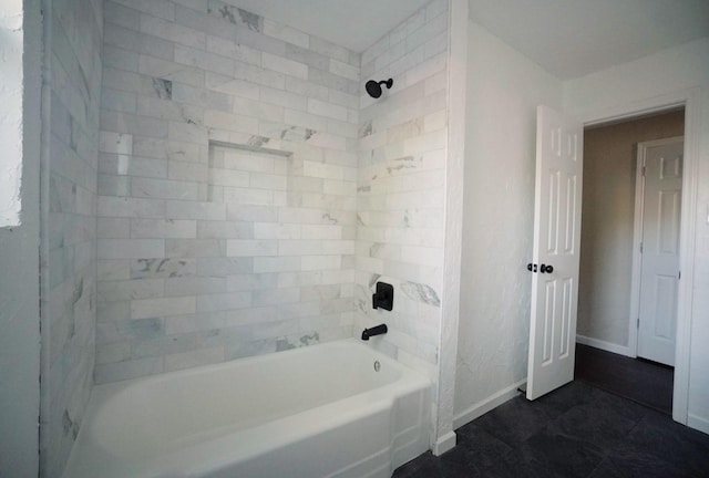 bathroom featuring tiled shower / bath combo