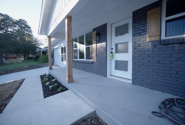 view of patio featuring covered porch