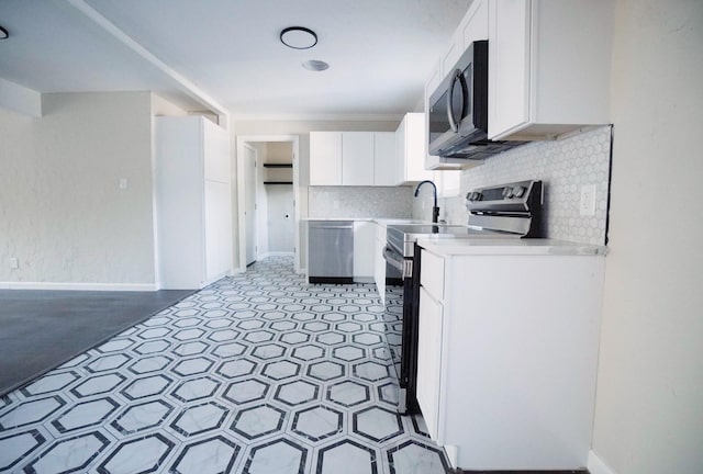 kitchen featuring white cabinets, range, and dishwasher