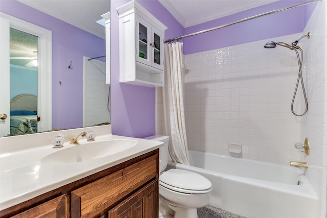 full bathroom with crown molding, vanity, shower / tub combo, and toilet