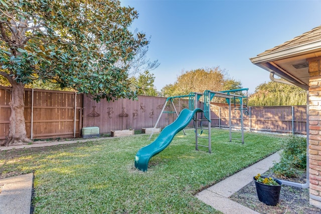 view of playground featuring a yard