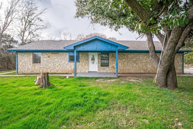 view of front of property with a front yard and a porch