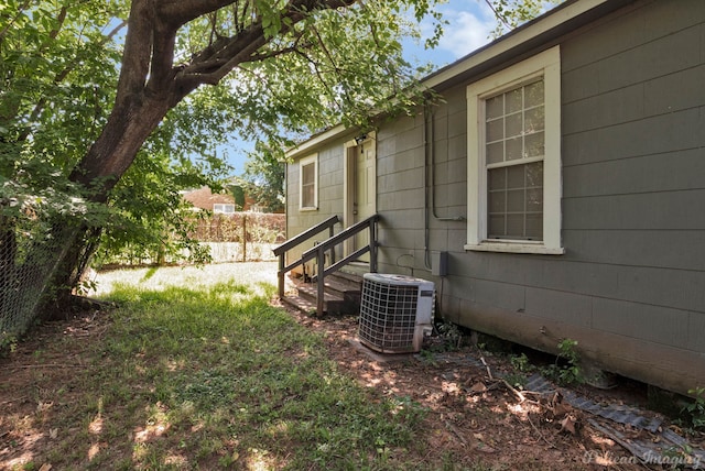 view of yard with central AC unit