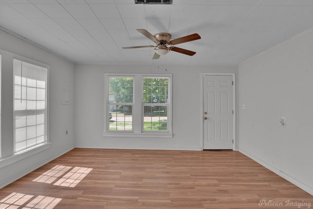 unfurnished room featuring ceiling fan and light wood-type flooring