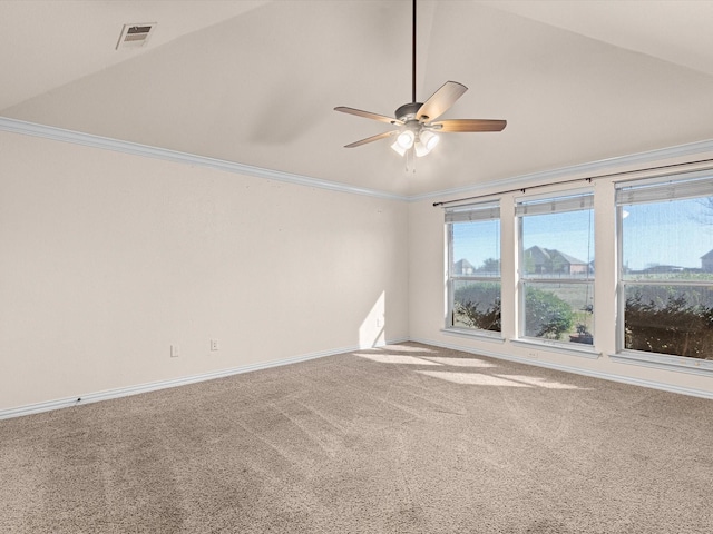 carpeted empty room with lofted ceiling, crown molding, and ceiling fan