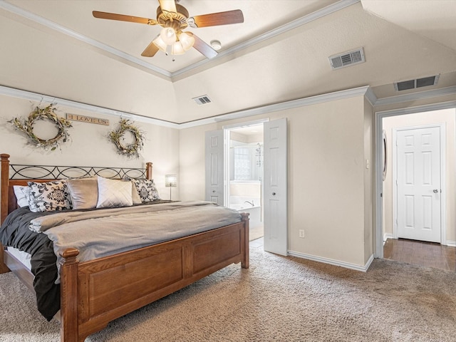 bedroom featuring carpet, ceiling fan, ornamental molding, and ensuite bath