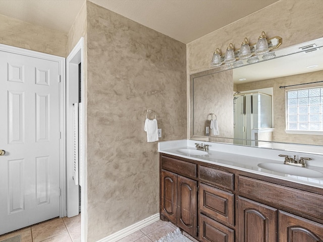 bathroom featuring tile patterned floors and vanity