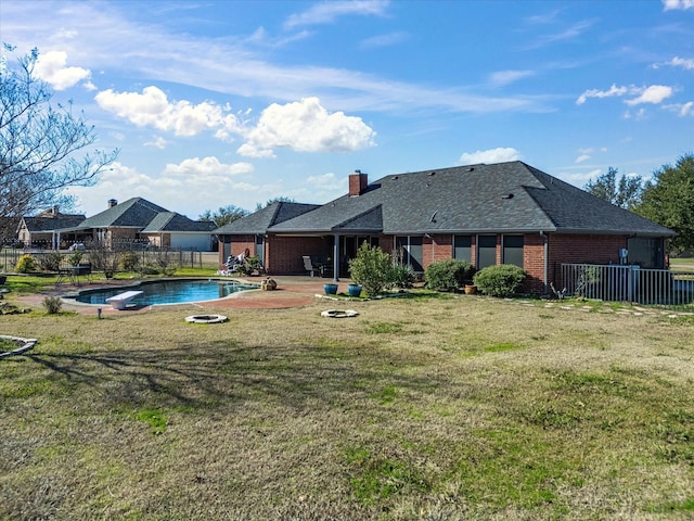 exterior space with a lawn and a patio area