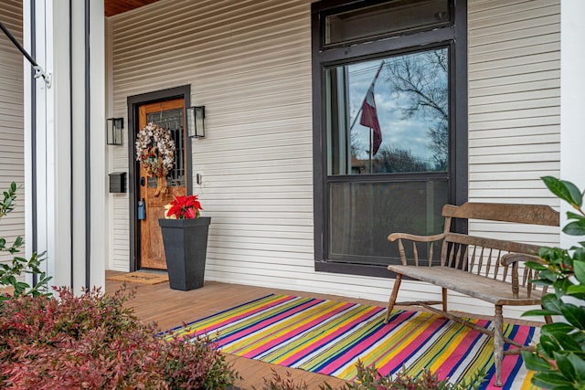 entrance to property with covered porch