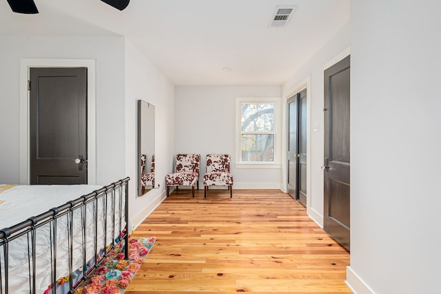 living area with wood-type flooring