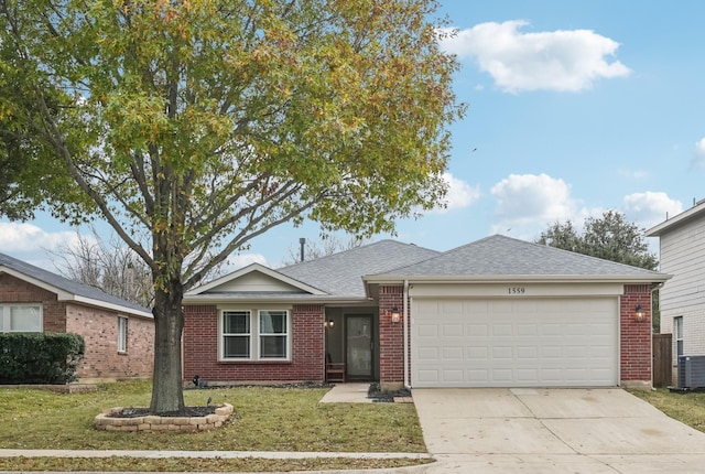 ranch-style house featuring a garage and a front yard