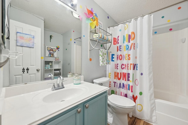 full bathroom with shower / bath combination with curtain, vanity, a textured ceiling, wood-type flooring, and toilet