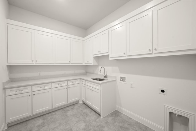 1604 Rolling Oaks Dr, Fort Worth, TX 76008 - laundry room featuring hookup for a washing machine, cabinet space, electric dryer hookup, and baseboards