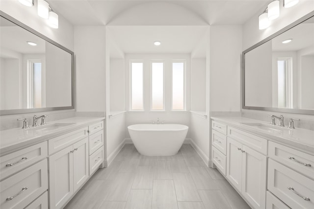 1604 Rolling Oaks Dr, Fort Worth, TX 76008 - full bath featuring healthy amount of natural light, baseboards, two vanities, and recessed lighting