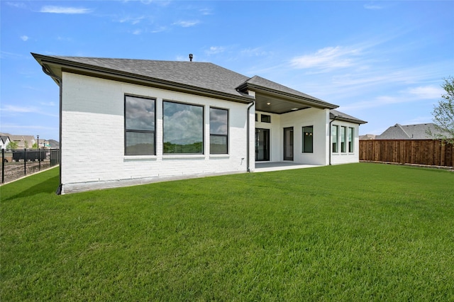 1604 Rolling Oaks Dr, Fort Worth, TX 76008 - rear view of property featuring a shingled roof and brick siding