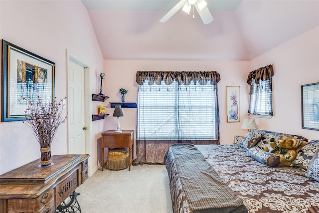 carpeted bedroom featuring ceiling fan and lofted ceiling