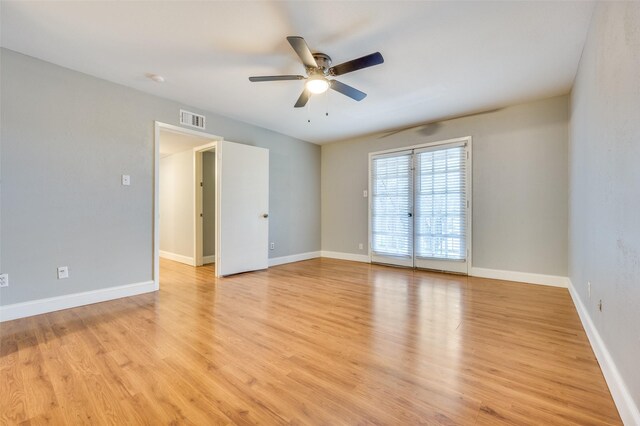 unfurnished room featuring ceiling fan and light hardwood / wood-style flooring