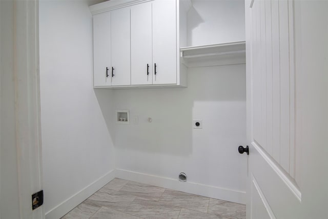 clothes washing area with electric dryer hookup, hookup for a washing machine, cabinets, and gas dryer hookup