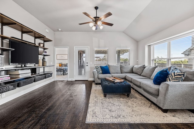 living room with dark wood-type flooring, vaulted ceiling, and ceiling fan