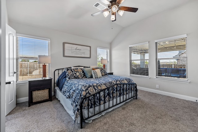 carpeted bedroom with lofted ceiling and ceiling fan