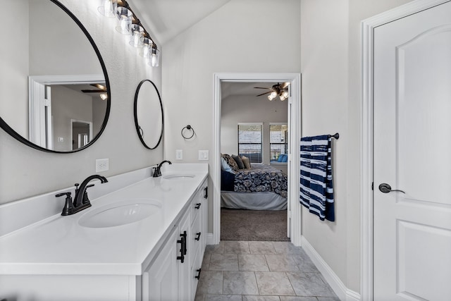 bathroom featuring lofted ceiling, vanity, and ceiling fan