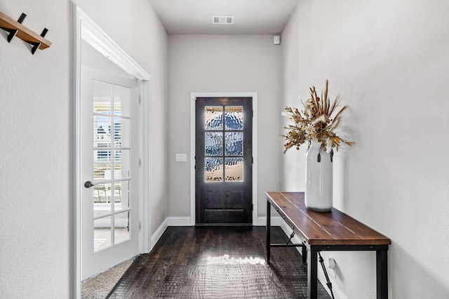 doorway featuring dark hardwood / wood-style flooring