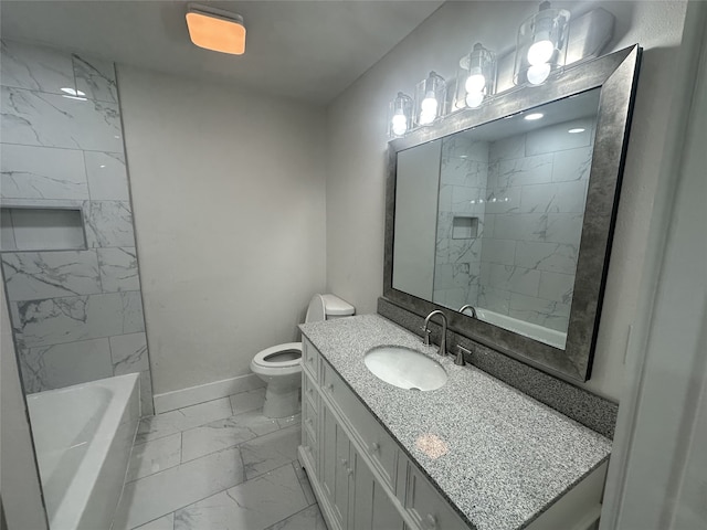 full bathroom featuring vanity, tiled shower / bath, and toilet