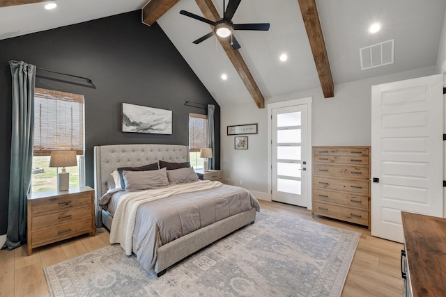 bedroom featuring ceiling fan, light hardwood / wood-style floors, beam ceiling, and high vaulted ceiling