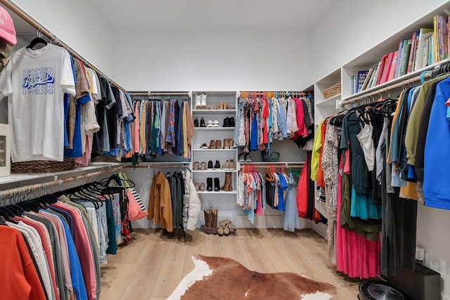 walk in closet featuring light wood-type flooring