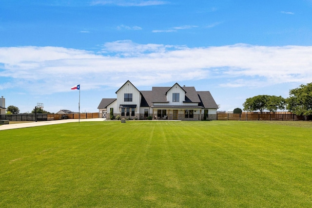 view of front facade with a front yard