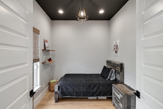 bedroom with light wood-type flooring