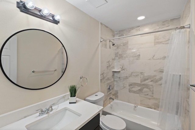 full bathroom featuring vanity, shower / bathtub combination with curtain, and toilet