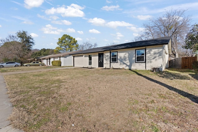 single story home with a front yard