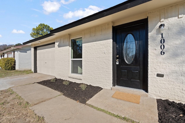 entrance to property with a garage