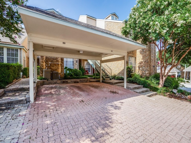 view of patio / terrace with a carport