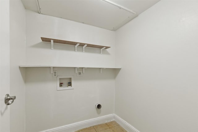 clothes washing area featuring hookup for a washing machine, light tile patterned floors, and electric dryer hookup