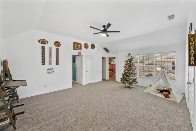 game room with ceiling fan, carpet, and lofted ceiling