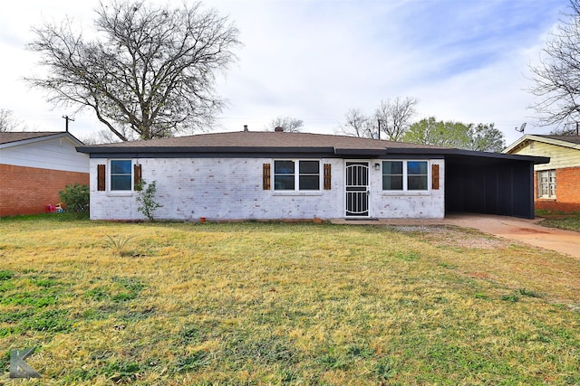 single story home featuring a front lawn and a carport